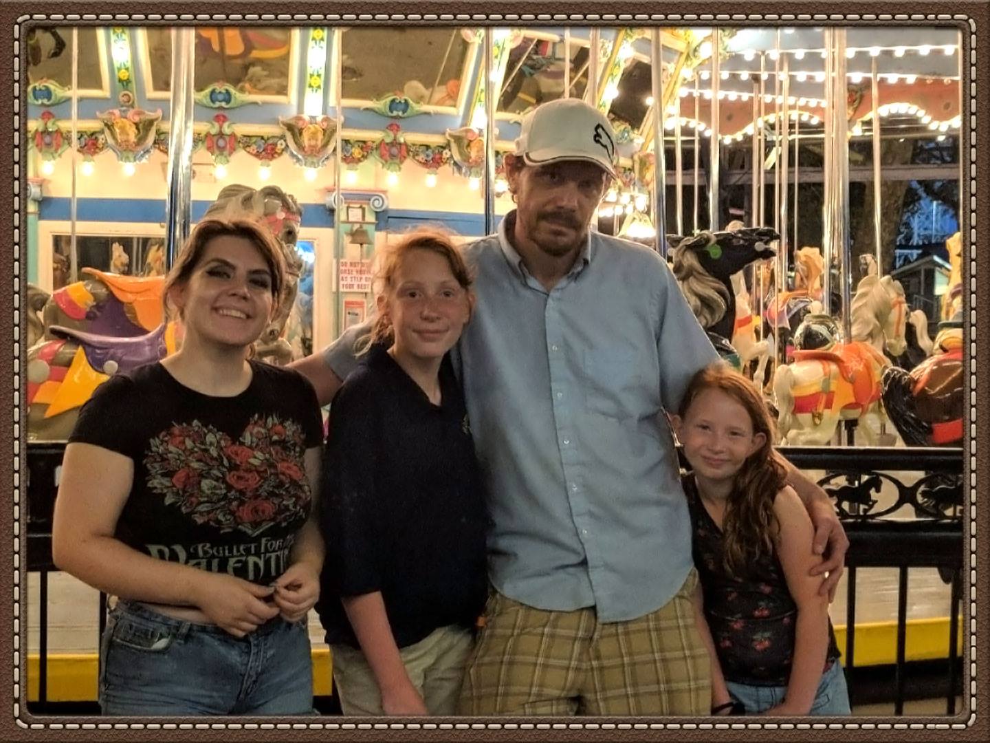 Daniel with his three daughters